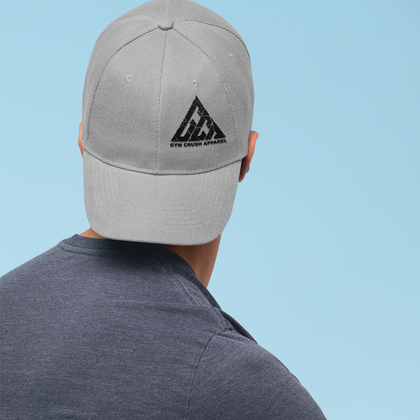 Man looking away wearing a gray ballcap with company logo